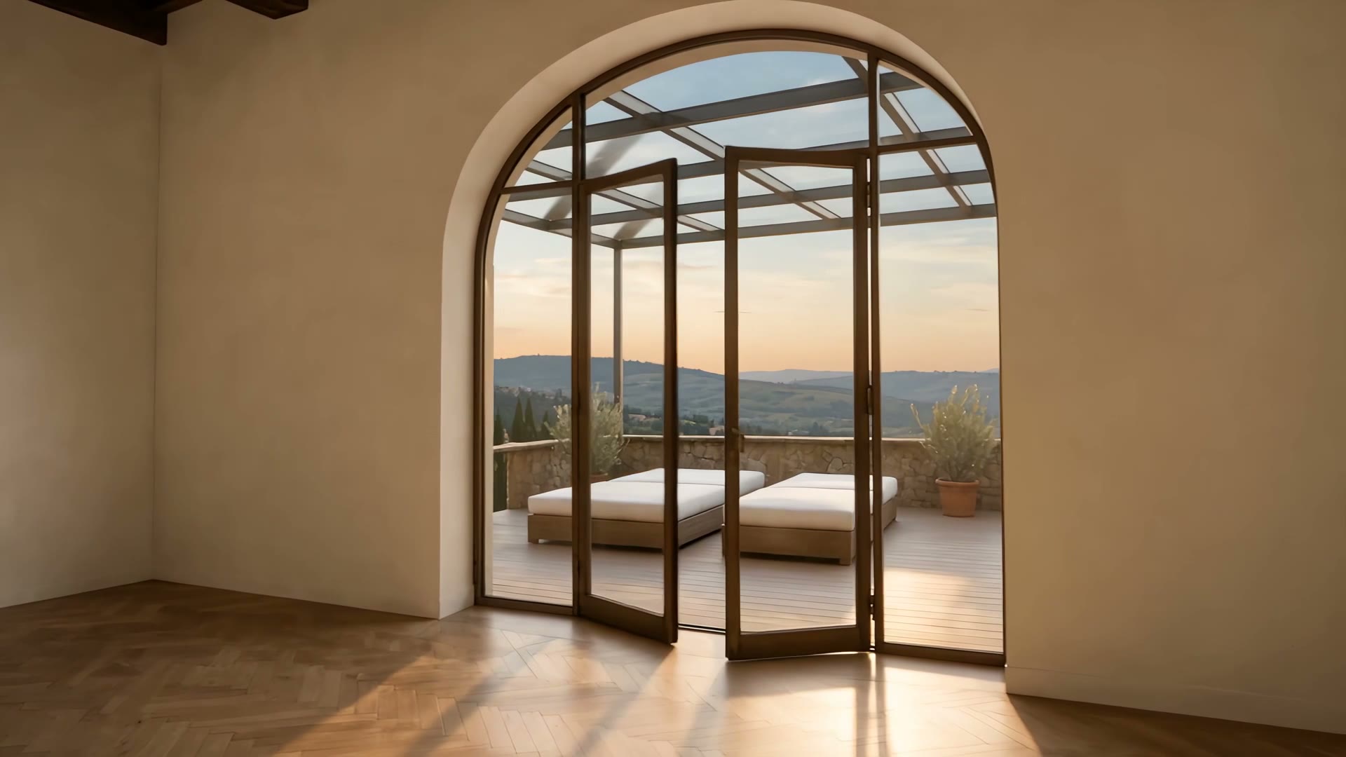 La terrazza con il decking e la pergola in vetro sulle colline al tramonto